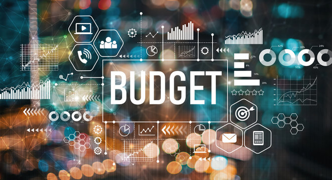 Budget with blurred city abstract lights background