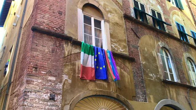 Lucca city moments, window with Flags