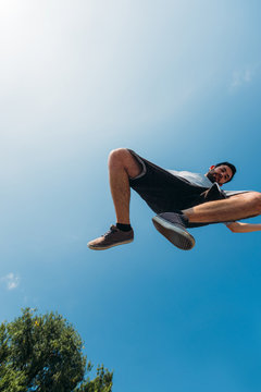 Free runner make parkour in the air