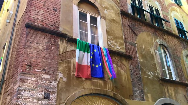 Lucca city moments, window with Flags