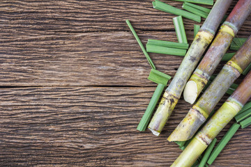 Close up sugarcane on wood background close up