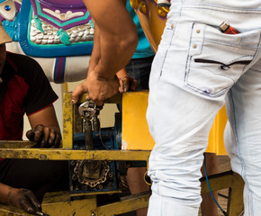Carousel repairing by workers