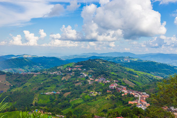 Fototapeta na wymiar Landscape panorama hills village at Doi Mae Salong Peak Chiang Rai Northern Thailand