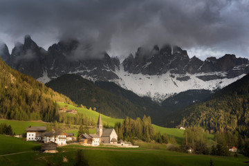 Fototapeta na wymiar Famous best alpine place of the world, Santa Maddalena village with magical Dolomites mountains in background, Val di Funes valley, Trentino Alto Adige region, Italy, Europe
