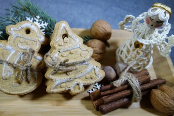 Decorative Christmas cookies, 
 nuts, cinnamon and anise stars.Christmas sweets and nuts.
  Christmas time
