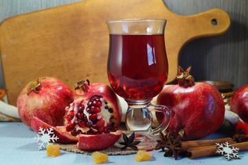 Pomegranate juice with pomegranate fruits
