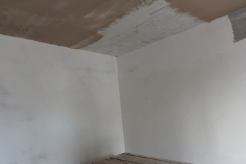 Walls in the stage of putty.Renovation and department premises