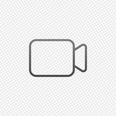 Video camera icon. Linear, thin outline. On grid background