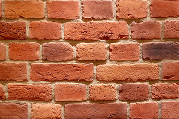 Background of brown building bricks. A wall of bricks.