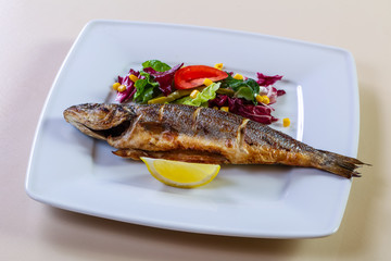 Grilled seabass with lemon
