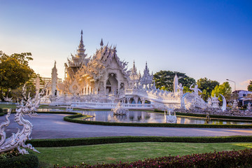 Fototapeta na wymiar Beautiful and amazing white art temple at Wat Rong Khun Chiang Rai, Thailand It is a tourist destination. Landmark of Chiang Rai