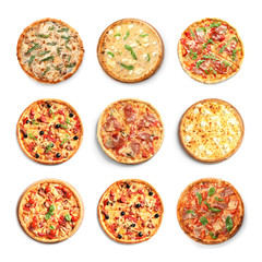 Set with different delicious pizzas on white background, top view