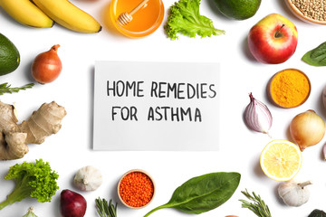 Natural products and paper with text HOME REMEDIES FOR ASTHMA on white background, top view © New Africa