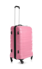 Trendy pink suitcase on white background