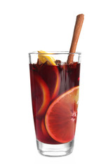 Glass with red mulled wine on white background