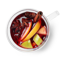 Cup with red mulled wine on white background, top view