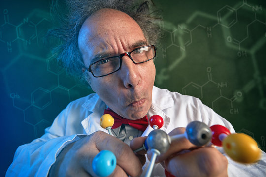 Funny scientist with molecules model