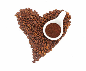 Heart-shaped coffee beans with crushed coffee beans on white background, illustration