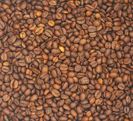 Backgrounds Many coffee beans are brown and have a pleasant aroma.