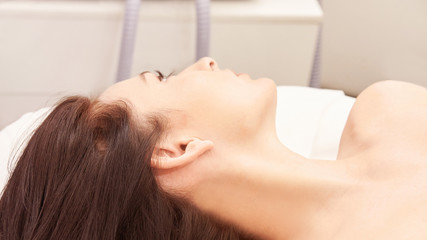 Obraz na płótnie Canvas Hair laser removal service. IPL cosmetology device. Professional apparatus. Woman soft skin care