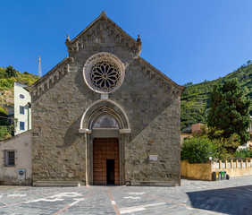 The facade of the beautiful Church of San Lorenzo in Manarola, Cinque Terre, Liguria, Italy