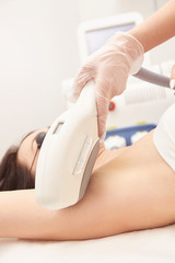 Hair laser removal service. IPL cosmetology device. Professional apparatus. Woman soft skin care
