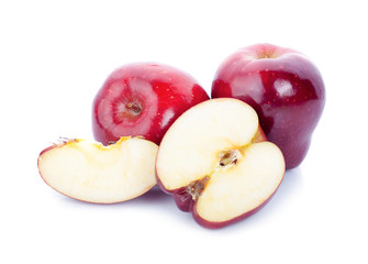 Red apples with apple slice on a white background.