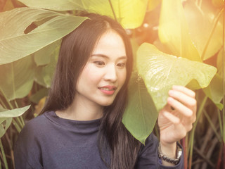 Portrait charming beautiful Asia woman at garden park nuture background.