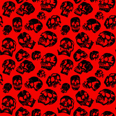 vector pattern black skulls on a red background halloween
