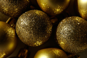 Golden Christmas decorations texture. Abstract background.