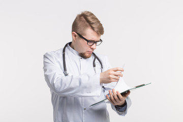 Male medicine doctor hand looking something on clipboard on white background.