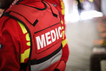Details of a paramedic uniform - obrazy, fototapety, plakaty