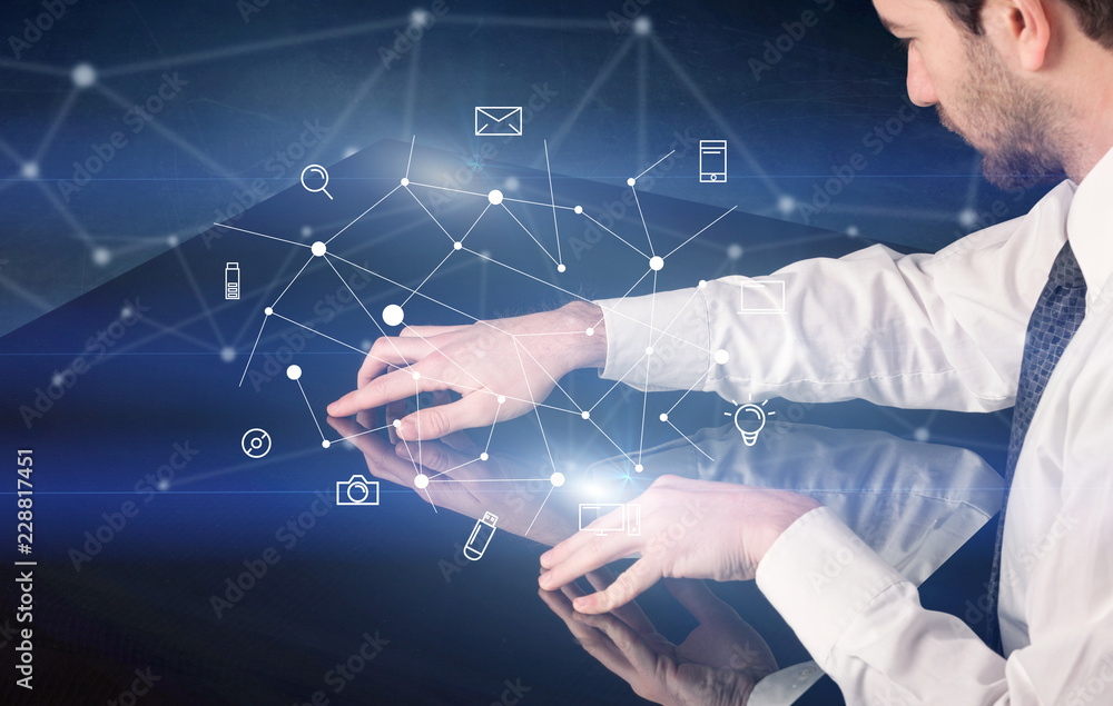 Poster male hands touching interactive table with blue mixed communication icons in the background