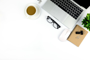 Workspace in office ,White desk with blank notebook and other office supplies,Top view with copy space.