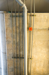 power line in running conduit tube on ceiling, galvanized steel conduit and piping