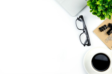 Workspace in office ,White desk with blank notebook and other office supplies,Top view with copy space.
