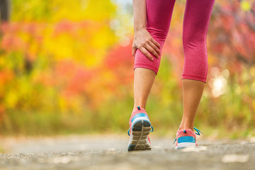 Leg muscle cramp calf sport injury outdoors exercise.