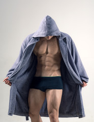 Muscular male model in underwear. Gay man in the morning after training. Spotlife and healthy...