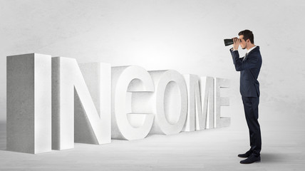Handsome businessman looking forward with binoculars at a job, income and money concept
