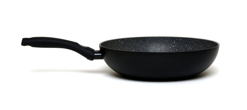 black frying pan isolated on white