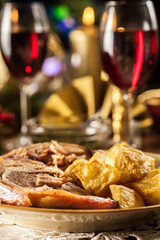 Traditional italian porchetta on festive table