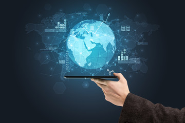 Hand using phone with multinational worldwide estate report concept
