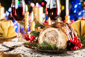Traditional italian porchetta on festive table