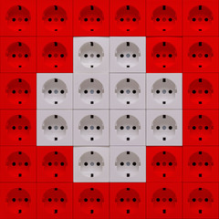 Electrical outlets in the colors of the flag of Switzerland