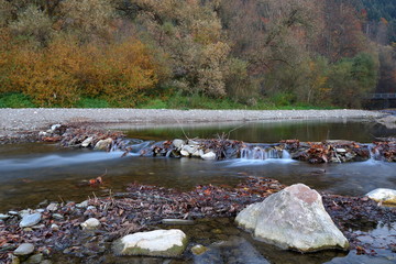 river in autumn forest
