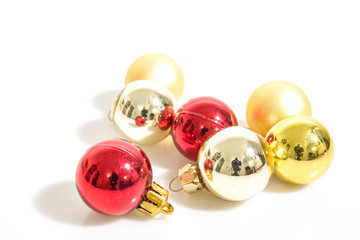 Christmas decorations, detailed red and gold christmas balls isolated in a white background