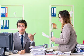 Two colleagues working in the office