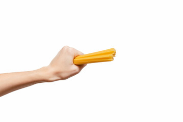 Femal hand holding pasta. Fodd Concept. White background, isolated, close up