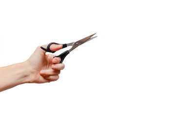 Femal hand holding scissors. Stationary  Concept. White background, isolated, close up