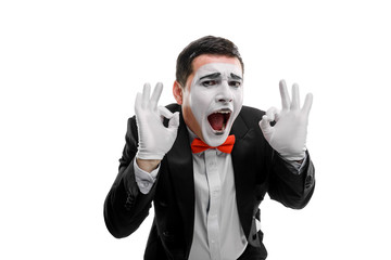 Cheerful male mime showing ok